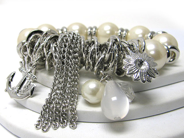 Mixed charm and tassel drop pearl stretch bracelet