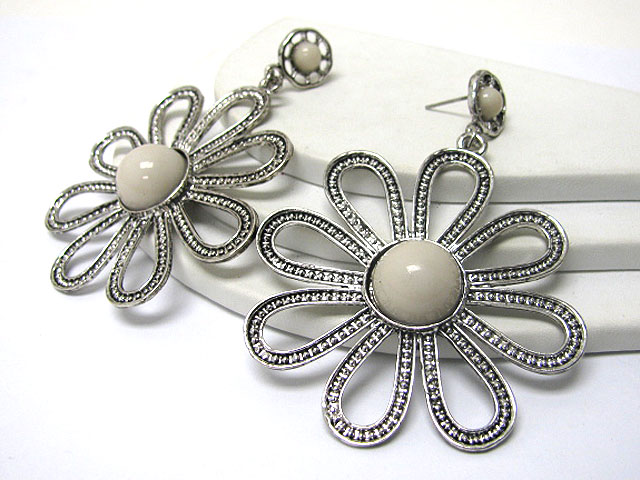 Large textured metal flower earring