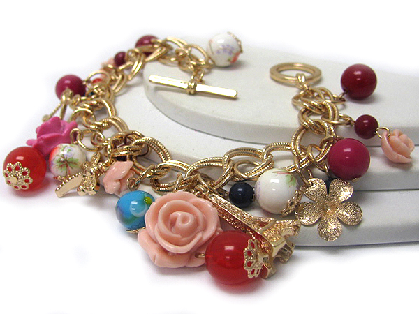 Multi flower charm and eiffel tower toggle bracelet