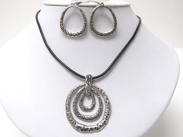 Textured metal triple round and cord necklace earring set