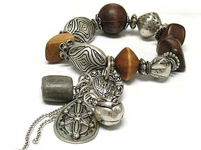 Wood and antique metal  linked and crystal paved tear pattern charm and wood deco stretch bracelet