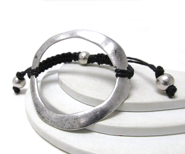 Metal hammerd round casting with cord stretch bracelet