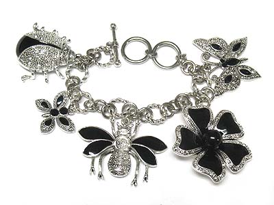 Jet tone metal flower and bugs theme charm dangle bracelet