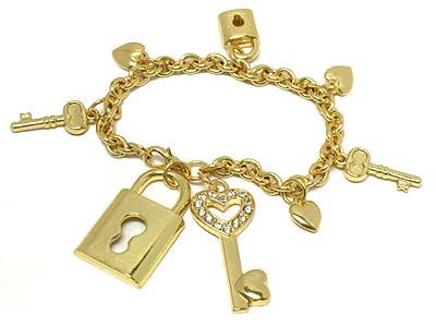 Lock and crystal key and other small charms bracelet 