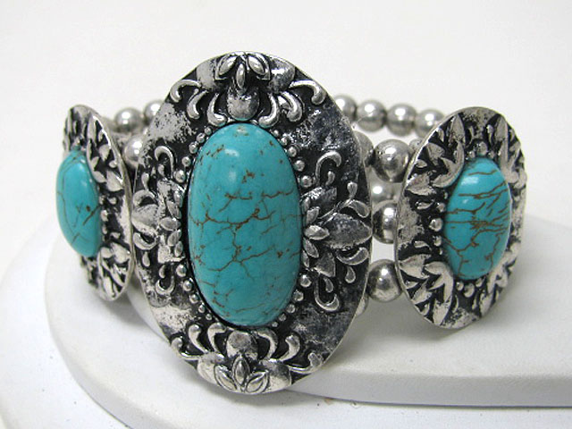 Turquoise stone and textured metal disk link stretch bracelet