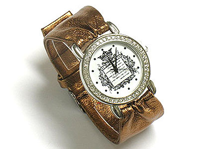 Designer inspired crystal frame and amblem background watch