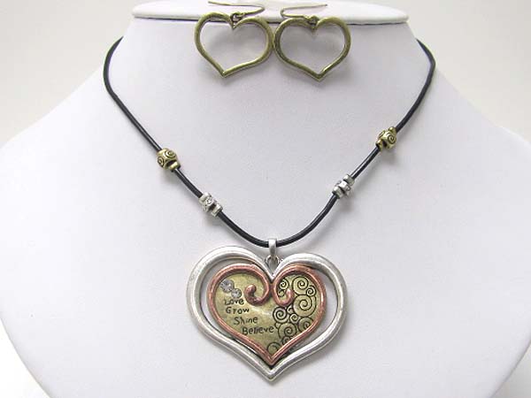 Textured metal double heart and cord necklace earring set