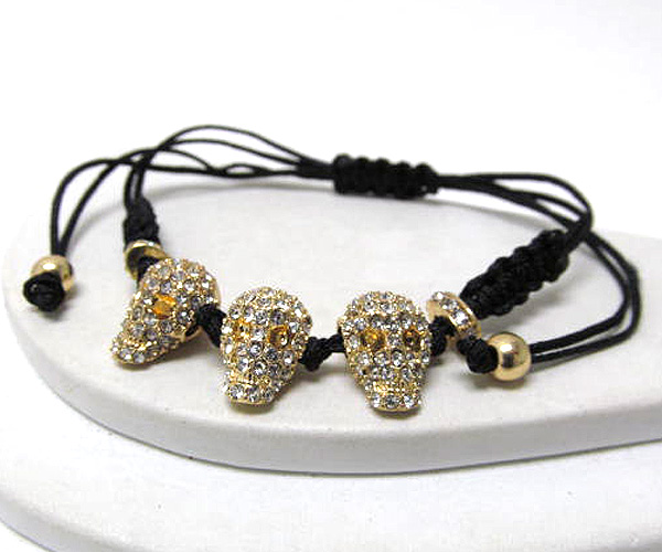 Crystal skull theme and braided yarn friendship bracelet