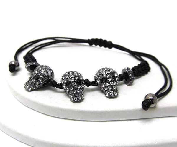 Crystal skull theme and braided yarn friendship bracelet