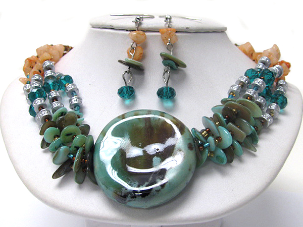 Figurine disk and multi chain chip stone necklace earring set