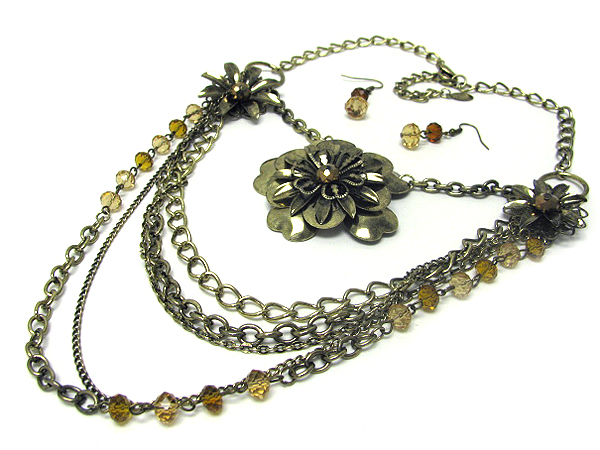 Multi layered chain and flower accent necklace earring set