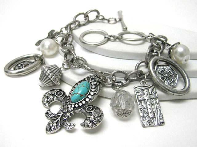 Turquoise deco fleur de lis and mixed charm dangle chain bracelet