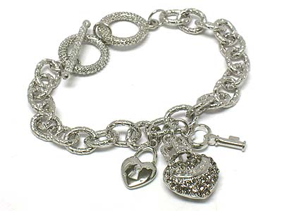 Crystal heart wearing crown and key and lock toggle bracelet 