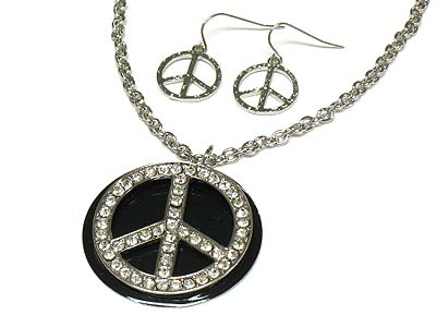 Epoxy coverd round disk that has mirror at the back and crystal peace pendant necklace and earring set