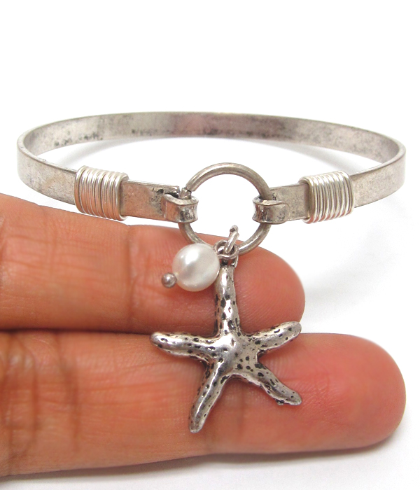 Starfish charm wire bangle bracelet