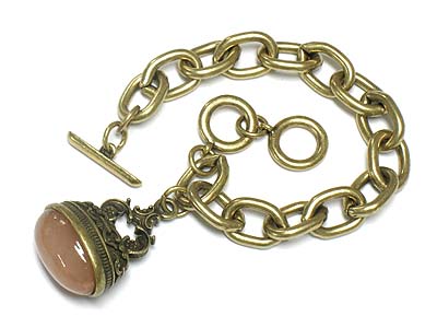 Heavy chain and filegree metal and stone charm dangle bracelet