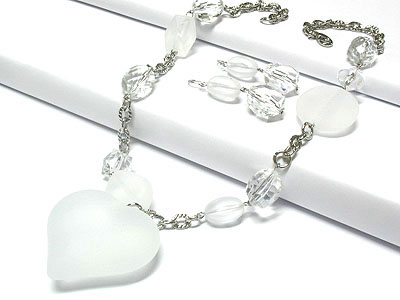 Semi transparent lucite snow bead and chain heart necklace and earring set - nude fashion trend