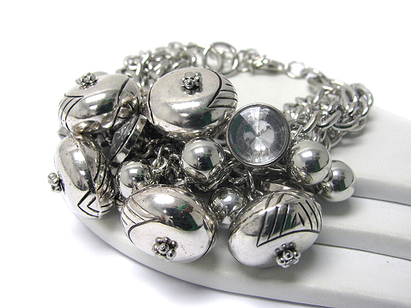 Multi metal puff disk and ball and crystal mix bracelet