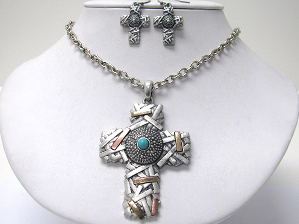 Center stone and textured metal art cross necklace earring set