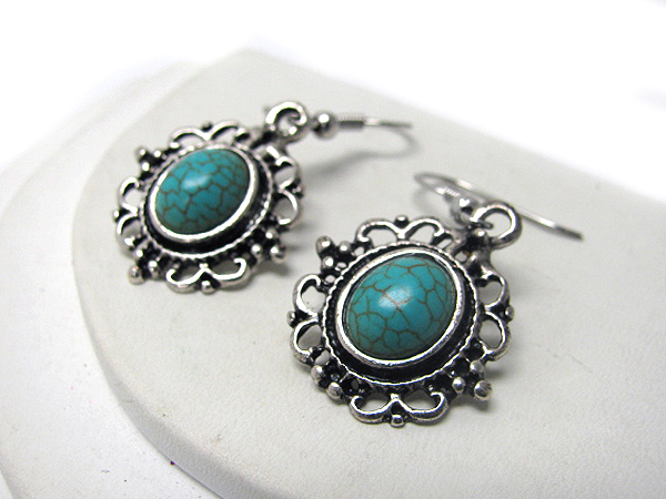 Oval turquoise and metal filigree earring