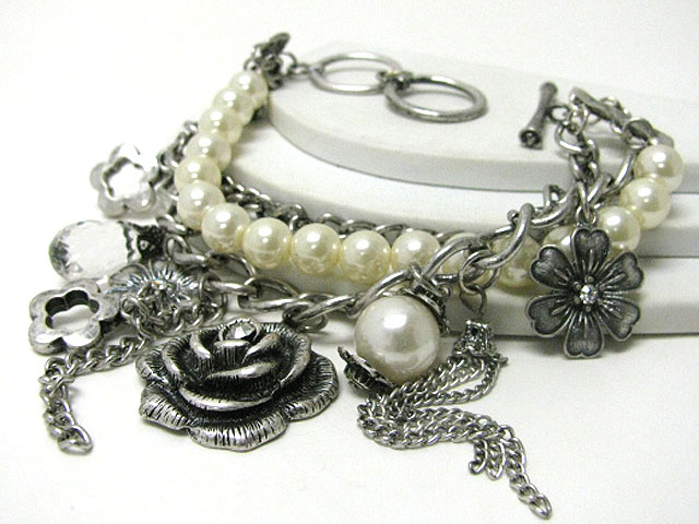 Multi metal flower charm pearl and metal chain link bracelet