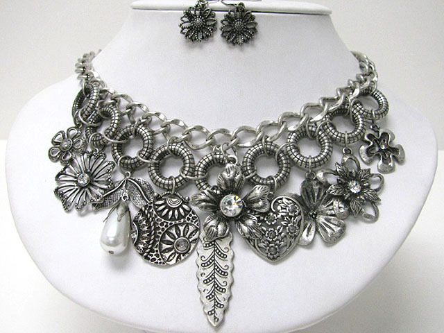 Crystal stud flowers and mixed textured metal charms dangle necklace earring set