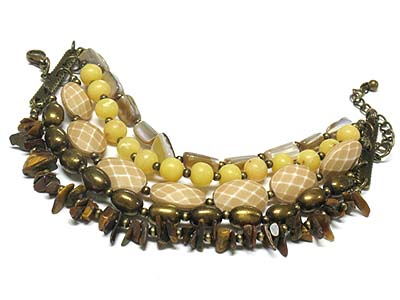 Multi  strands pearl shell  and facet acryl beads bracelet