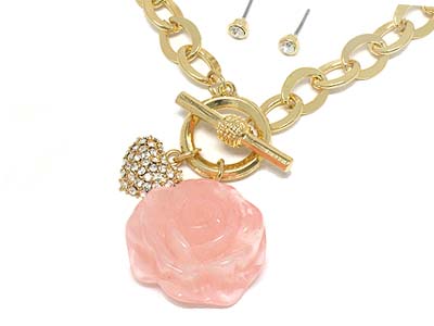 A rose made of precious stone and crystal heart charm toggle necklace and earring set