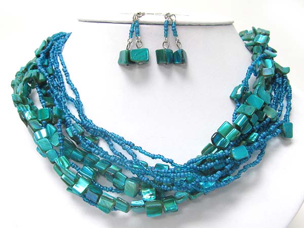 Multi strand shell ans seed beads necklace earring set