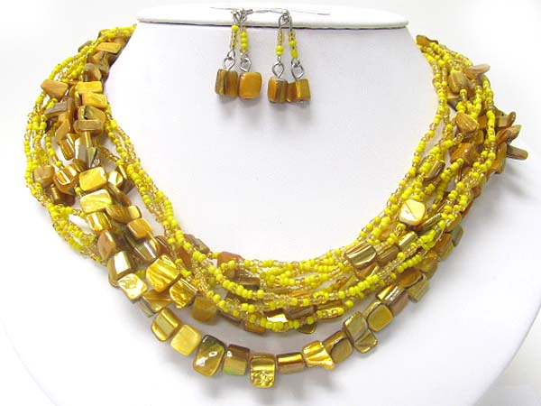 Multi strand shell ans seed beads necklace earring set