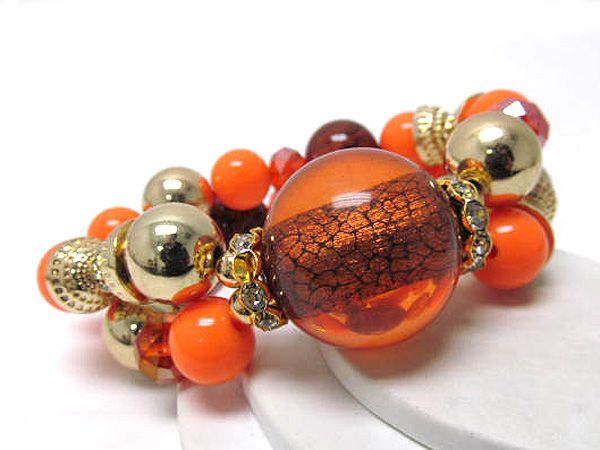 Multi acryl balls and metal with large glass ball prited snake skin stretch bracelet 