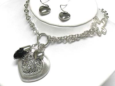 Metal filigree heart pendant necklace and earring set