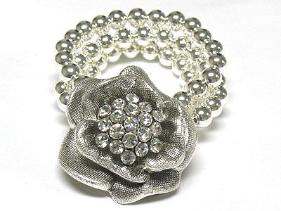 Crystal deco metal flower accent triple stretch bracelet