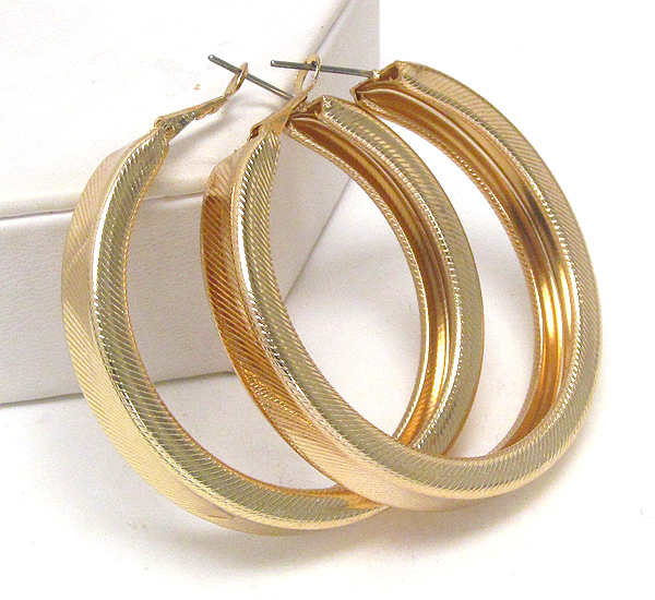 Textured metal hoop earring - hoops