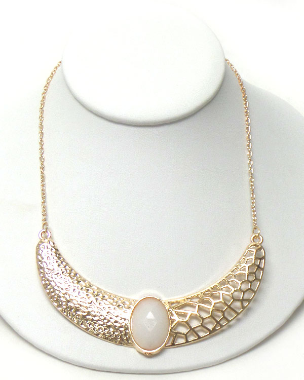 Faux stone center on textured metal filigree necklace