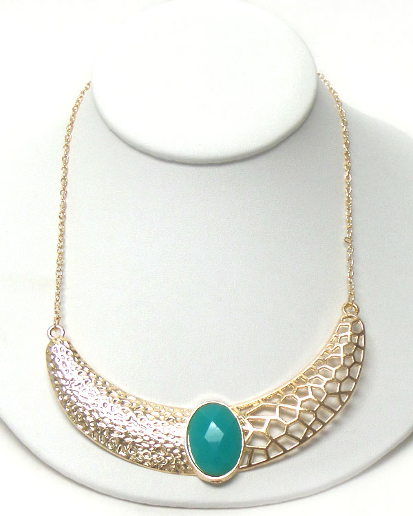 Faux stone center on textured metal filigree necklace