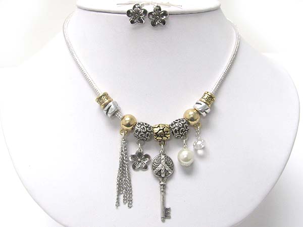 Textured metal key pendant and mixed dangle neckalce earring set