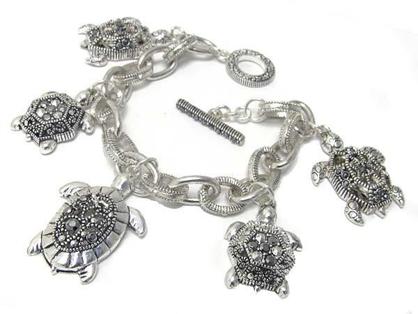 Marcasite look textured metal turtle charm toggle bracelet