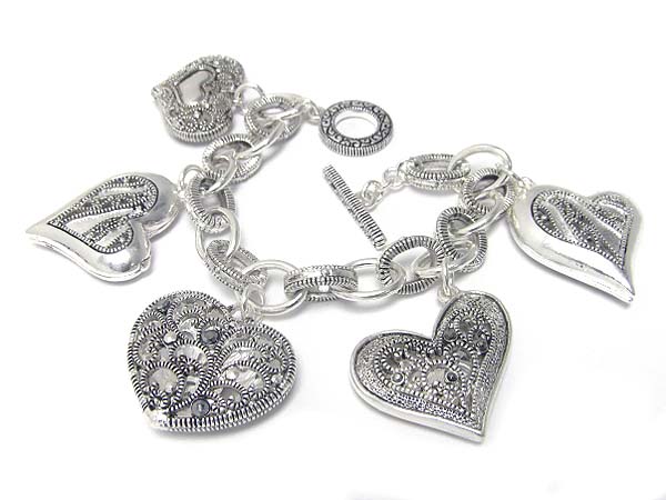 Marcasite look textured metal heart charm toggle bracelet