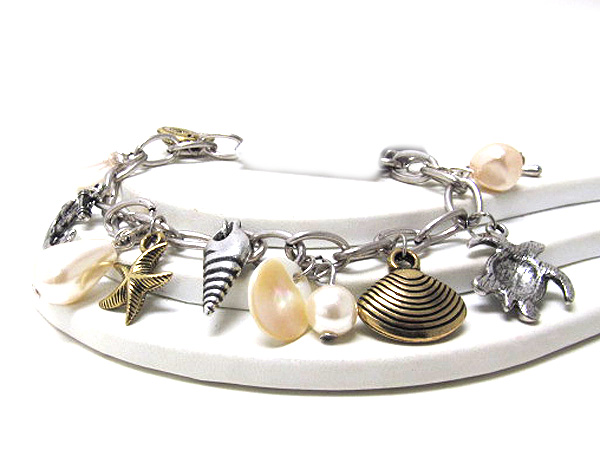 Sea charm and pearl dangle chan bracelet