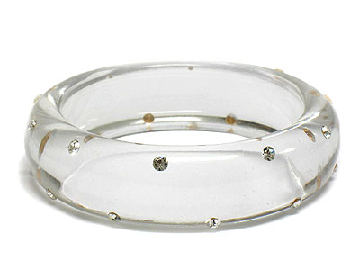 Transparent lucite bangle with  crystal stud - nude fashion trend