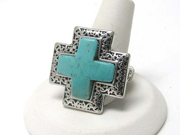 Turquoise stone textured metal cross stretch ring