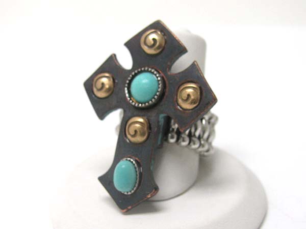 Turquoise and metal stud patina cross stretch ring