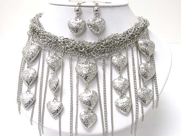 Textured metal heart and tassel drop multi chain necklace earring set