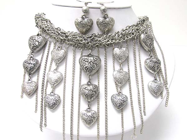 Textured metal heart and tassel drop multi chain necklace earring set