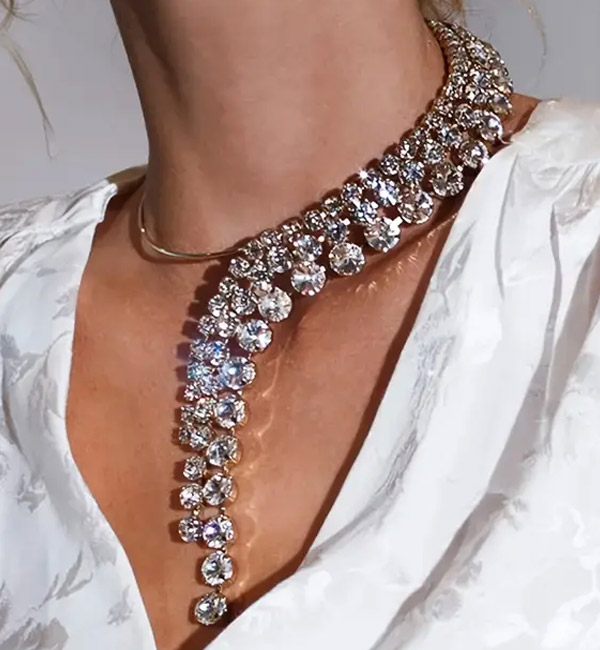 Dazzling cascading crystal necklace with asymmetric design party set