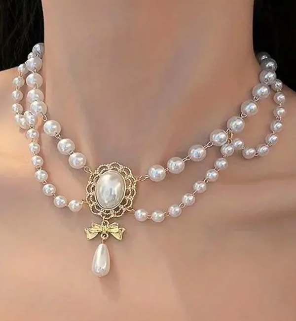 Vintage double-strand pearl necklace with bow pendant party set