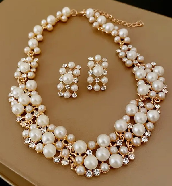 Luxurious pearl cluster necklace with matching crystal earrings party set