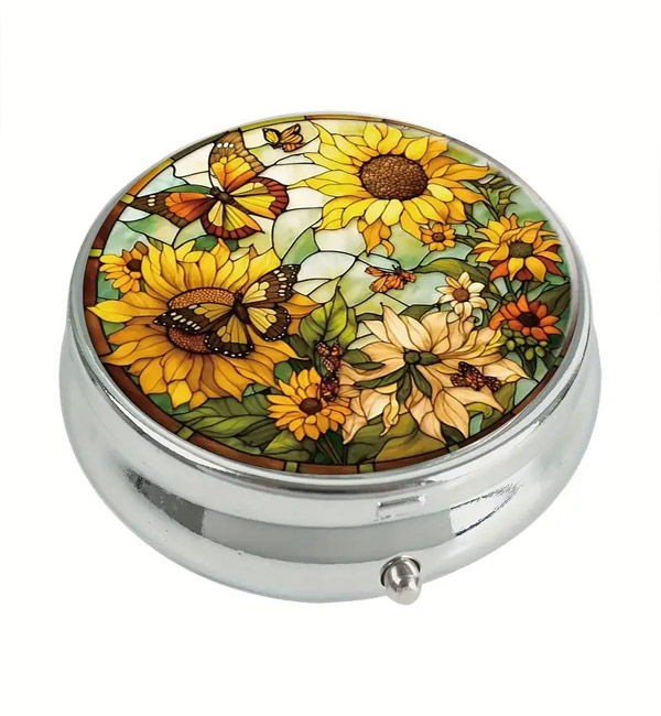 Decorative sunflower and butterfly pill box