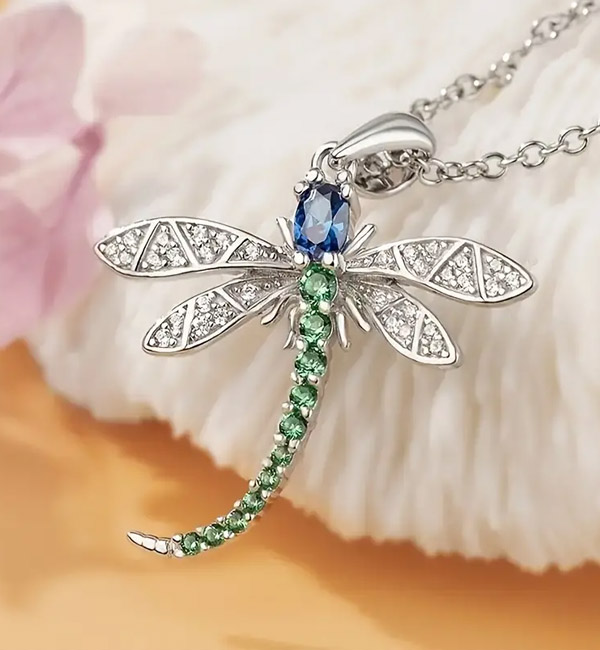 Elegant dragonfly necklace with blue and green gemstones, silver chain